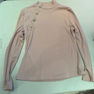 Pink turtle neck with a silver button detail